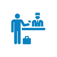 Traveler checking in at hotel front desk